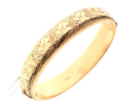 9ct gold bangle, having allover floral and foliate engraved decoration, 17g approx