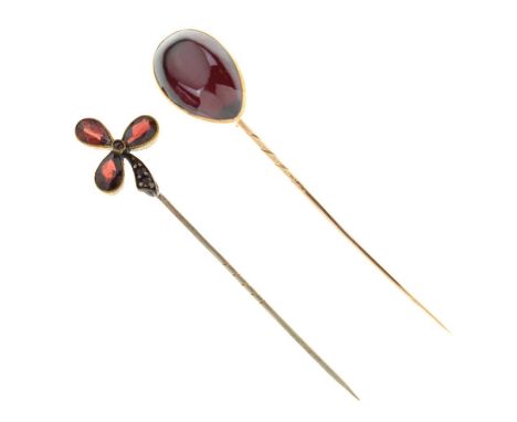 Two red stone set stick pins, unmarked, 6.4g gross approx (2)