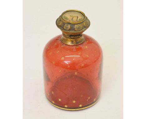 Late 19th or early 20th century Palais Royal ruby glass bottle, decorated with gilt stars, with Arc de Triomphe hinged cap, 1