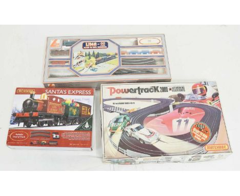 Hornby 00 gauge R1210 'Santa's Express' railway trainset, together with a Lima 'Road to Rail Terminal' set and a Matchbox 'Po