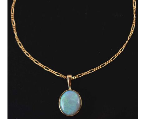 Opal cabochon 9ct gold pendant, on a 9ct gold Figaro link chain, 39cm long approx, 4.1g gross approx