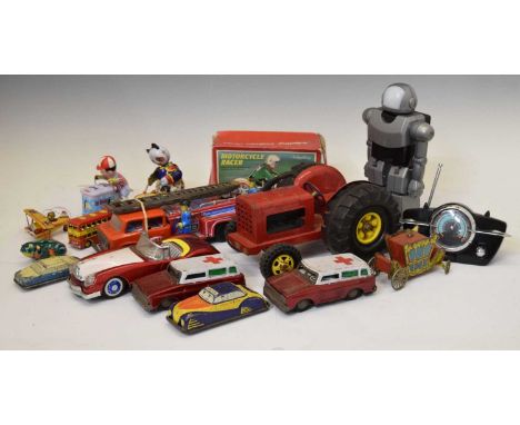 Quantity of reproduction tinplate and other toys to include; convertible car, fire engine, tractor, panda playing the drums, 