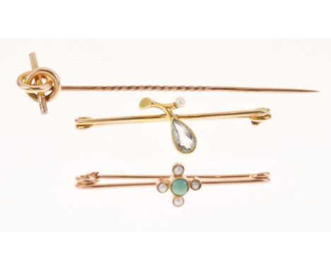Edwardian aquamarine and seed pearl yellow metal brooch, an Edwardian turquoise and seed pearl brooch, and a 15ct gold stick 