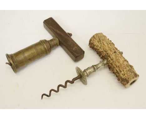 19th century Thomason-type brass corkscrew with later wooden handle, together with synthetic stag horn handled example (2)