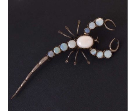 White metal scorpion brooch set with white opal cabochons, 7.5cm long approx, unmarked