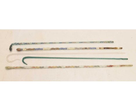 Five Nailsea type glass walking sticks, three filled multi coloured 'hundreds and thousands', 108cm high and smaller (5)