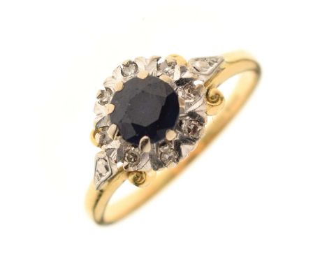 Sapphire and diamond illusion set cluster ring, stamped '18c', size R approx, 4.5g gross approx