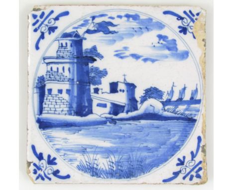 An 18thC English blue and white Delft tile, centred by a ruin and ships with floral spandrels, 13cm wide.