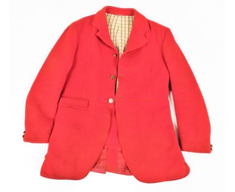A hunting pink coat, by a Caldene, size 107cm / 42", with two Quorn Hunt brass buttons, and plain button.