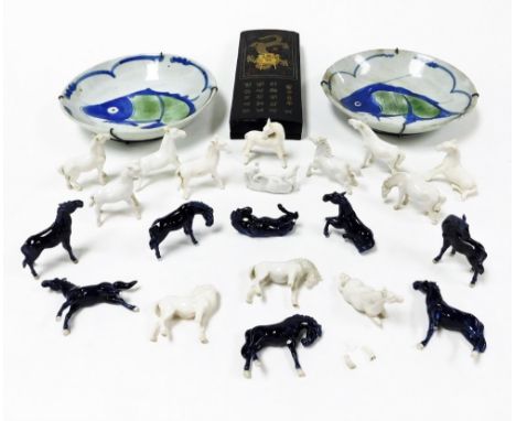 A group of Oriental wares, comprising a pair of Japanese bowls with fish decoration, 23cm high, various ceramic horses and a 
