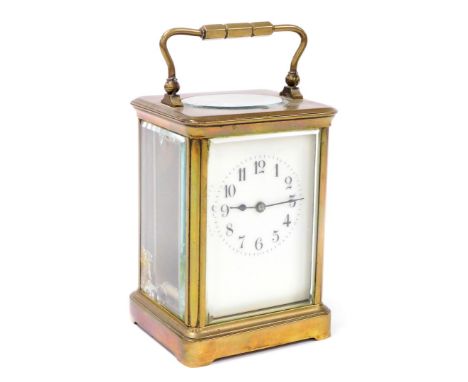 A gilt brass carriage clock, with time piece movement, with enamel dial, 13.5cm high excluding handle. (AF) 