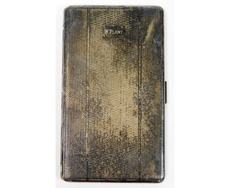 A silver plated cigarette case, with engine turned decoration bearing the initials W.Plant, inscribed to inside Made in Engla