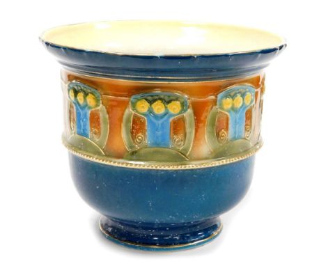 A Royal Staffordshire pottery Art Nouveau planter, in a blue, brown, green and yellow ground, with Wilkinson Limited stamped 