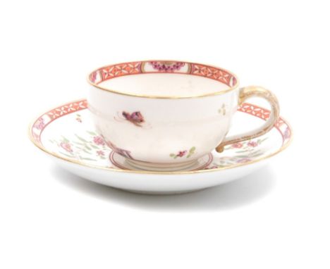 A Dresden cup and saucer, the white porcelain decorated with figures, flowers, butterflies and oriental figures, with gilt de