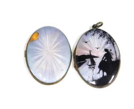 A Norwegian enamel locket, the oval locket with pink, blue and black enamelling of a figure by a river with ship, white metal