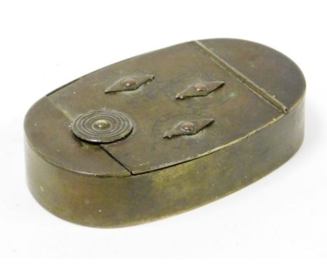 An early 19thC novelty brass snuff box, oval with coded entry, set with three Roman numeric clocks with articulated diamond s