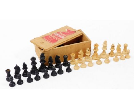 A Staunton boxwood chess set, in wooden box with red house martin Staunton chess sticker.