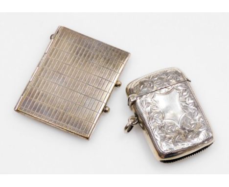 Two silver trinket items, to include a silver vesta case, with match strike base, Birmingham assay, hallmarks rubbed, togethe