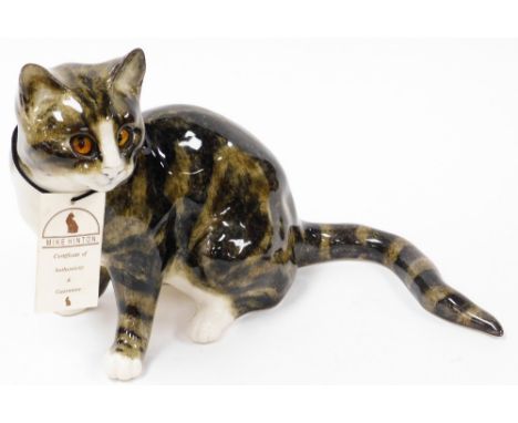 A Mike Hinton ceramic cat, signed to base Mike Hinton and numbered 001, with a certificate of authenticity and guarantee, 28c