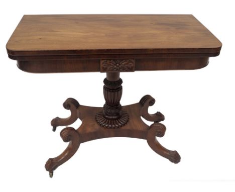 An early 19thC mahogany card table in the manner of Trotter of Edinburgh, with rounded rectangular folding and swivel top wit