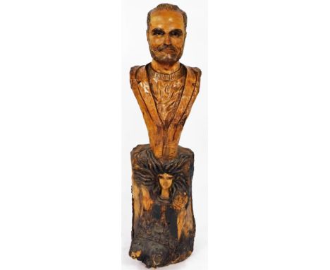 Willard Wigan M.B.E. (b.1957). Gianni Versace, a rustic carved head and torso portrait bust, over the Versace Medusa, carved 