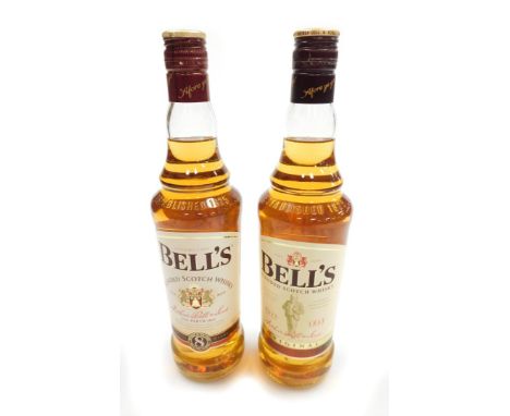 Two Bell's Old Scotch whisky, 70cl bottles, comprising 8 year mature aged bottle and The Original.  (2)