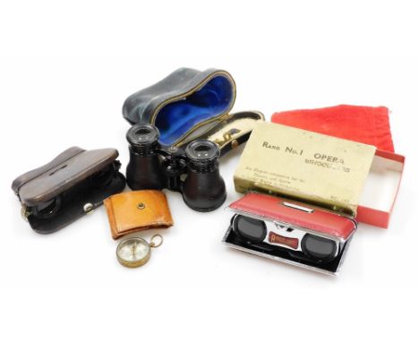 A group of opera glasses, to include a late 19thC set in fitted case, a set of fold out Lamignonne opera glasses, and a boxed