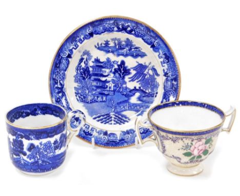 Various blue and white decorative wares, to include a Royal Doulton two handled tea cup, with gilt rose decoration, 7cm high,