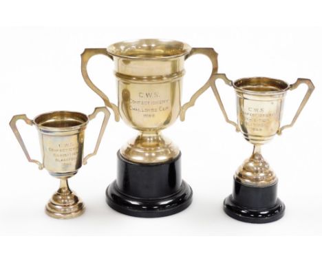 Three silver trophies, to include one for CWS Confectionary Exhibition Blackpool 1959, Birmingham 1946, 10cm high, another fo