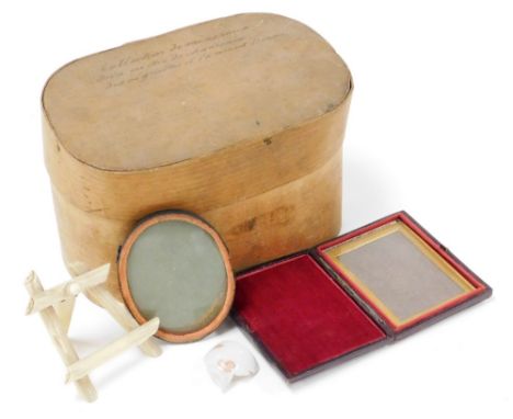 An early 20thC bone miniature artist easel, with articulated back and Oxford style frame, 9cm high, an oval portrait miniatur