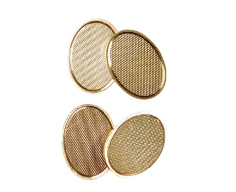 A pair of 9ct gold oval cufflinks, with engine turned decoration, 12.7g.