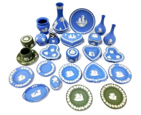 A group of Wedgwood Jasperware ornaments, in blue and green, comprising trinket dishes, miniature tankards, bud vases, trinke