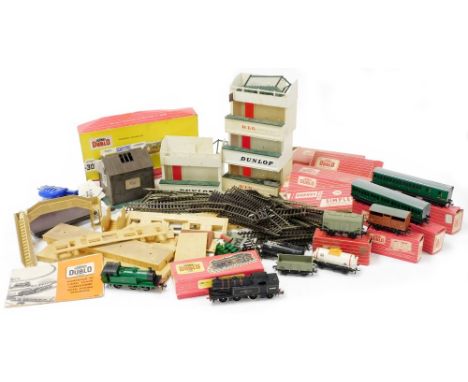 A Hornby Dublo, number 2217 0/6/2 tank locomotive BR, together with Suburban coaches number 4025 and 4026, 8/ton cattle wagon