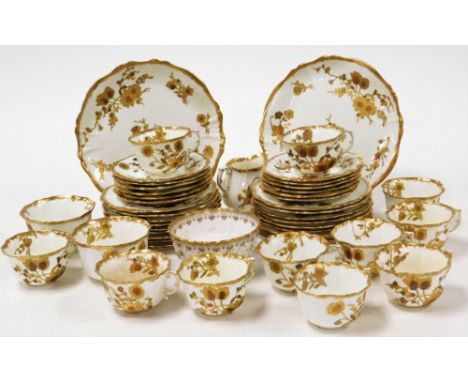 A Hammersley &amp; Co part dinner service, in the Bazar Inglis pattern, with gold floral banding, comprising eleven cups, eig