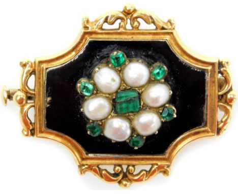A Victorian plaque brooch, with gold frame enclosing an enamel ground set with pearls and emeralds, 30mm x 35mm. (AF)