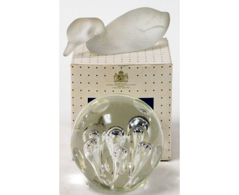 Two items of glass, to include a Caithness paperweight and a Baccarat France model of a seated duck. 