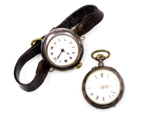 Two silver cased fob watches, to include a Continental fob watch, with white enamelled dial, with gilt tooled decoration, bez