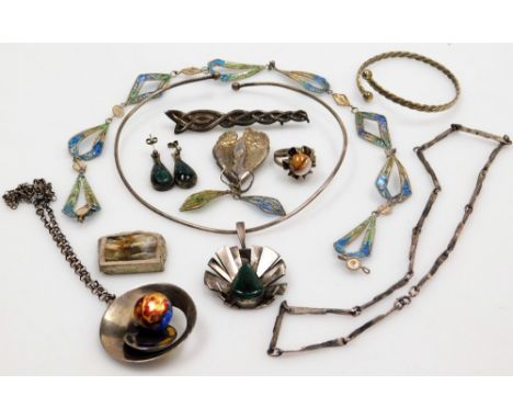 Silver jewellery designed by Dorothy Budd, including a pendant collar, pendant on chain, swan brooch, Maltese style filigree 