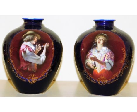 A pair of late 19thC Austrian porcelain baluster vases, blue ground with gilt and having oval reserves of a pipe smoking gent