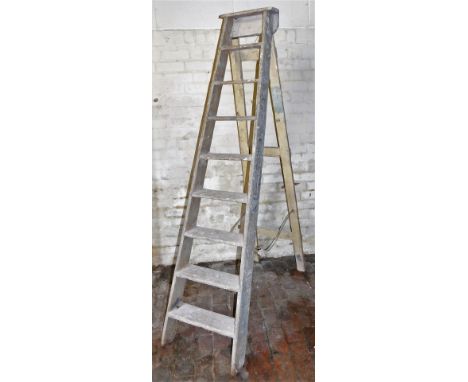 A Victorian wooden step ladder, 220cm high when folded.