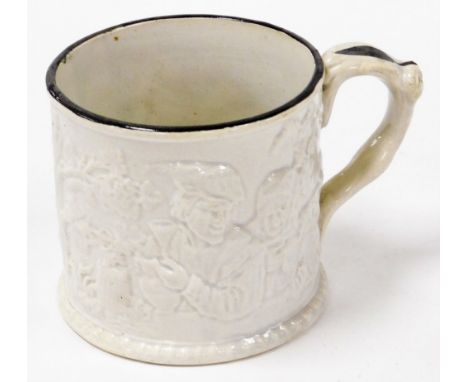 A Victorian pottery toad mug, the white mug with a raised relief decoration of tree with grape vines and a figure of a farmer