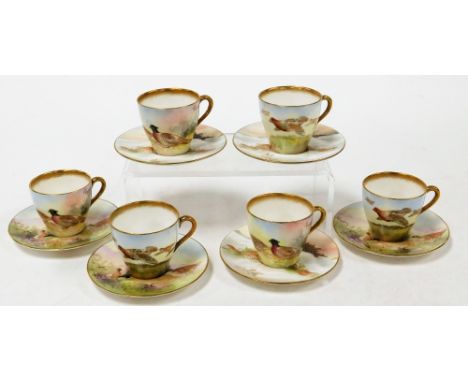 Six Royal Doulton porcelain cups and saucers, three depicting grouse and numbered BB3530 H4586, bearing signature M Betteley,