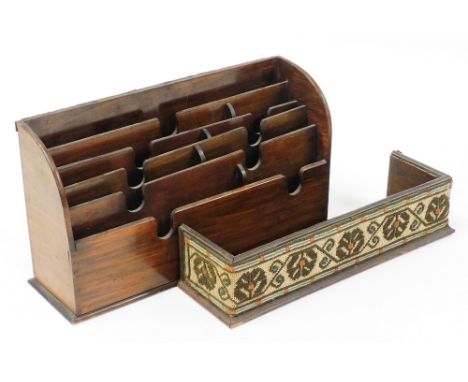 A mahogany desk tidy letter rack and a tapestry banded miniature enclosed book rack, 38cm and 40cm wide. (2)