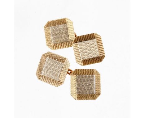 A pair of 9ct gold engine turned cufflinks, each of square design, with ribbed design border and white gold centres, on curb 