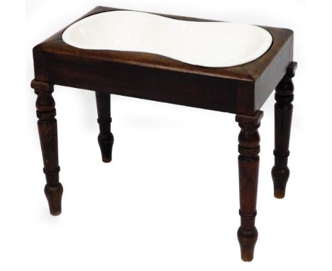 An early Victorian mahogany bidet, with ceramic liner. 