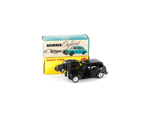 Dinky Toys Austin Taxi (254). A late example in black with dark grey base and plated spun wheels and black treaded tyres. In 