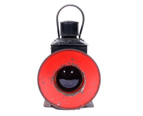 A British Railways Southern Region Buffer Stop Lamp. A single aspect lamp with red warning ring around the red lens. GC for a