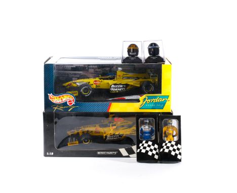 3x 1:18 scale F1 racing cars driven by Damon Hill. An Onyx Williams Renault in blue and white Elf livery, RN5. A Hot Wheels J