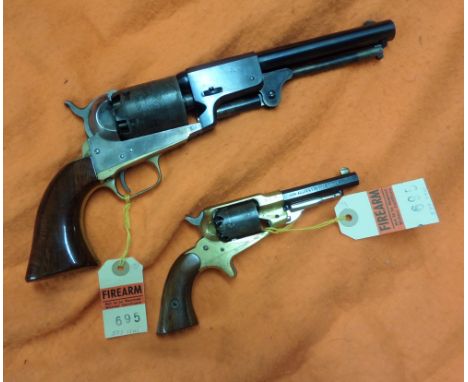 **A modern Italian 6 shot .44” Colt 3rd Model Dragoon percussion revolver,  number A89071; and a similar 5 shot .31” Remingto