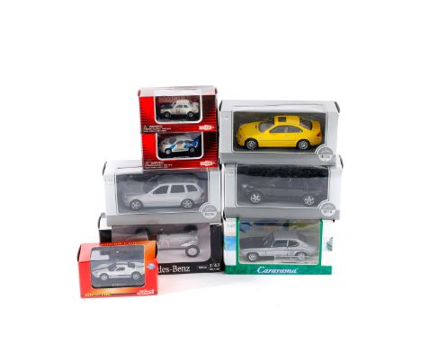 55 vehicles by various makes. Including 1:18, 1:24 1:43, 1:87 scale models. 1:18 examples include Mercedes 300SL, Chevrolet C